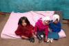 Dolls on a pink matress - Ecuador